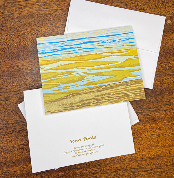 Note cards featuring a sandy beach by New England artist Hannah Phelps.