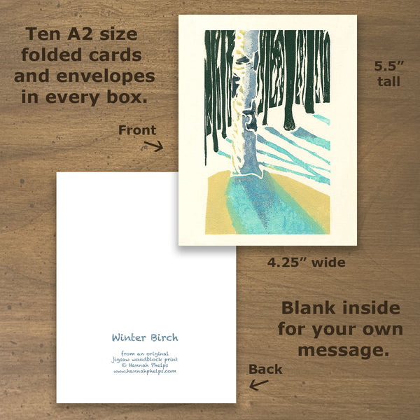 Note cards showcasing a jigsaw woodblock print by New Hampshire artist, Hannah Phelps, of a birch tree in the snowy woods of New England..