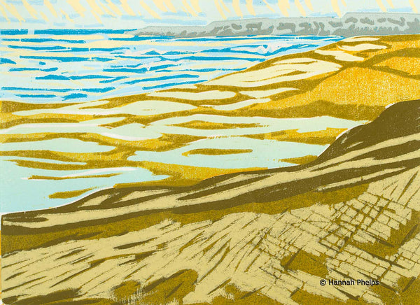A jigsaw reduction woodblock print of a New England beach by artist Hannah Phelps