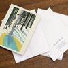 A2 size note cards with a handmade print of a tree in the snowy woods by New Hampshire artist, Hannah Phelps.