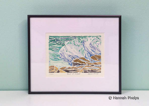 Framed white-line woodcut print of a wave crashing on rocks in Maine by New England artist, Hannah Phelps
