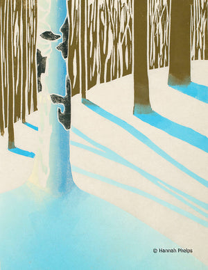 Hand-pulled woodblock print of a snowy forest by artist Hannah Phelps